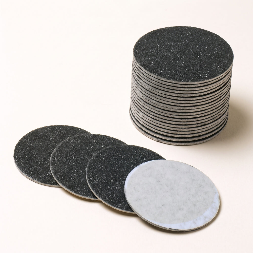 Disques abrasifs de rechange 43 mm : une pile et quatre disques, face granuleuse et dos autocollant