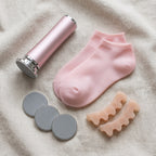 Kit soin des pieds : râpe électrique, disques, chaussettes hydratantes en silicone et écarteurs d'orteils
